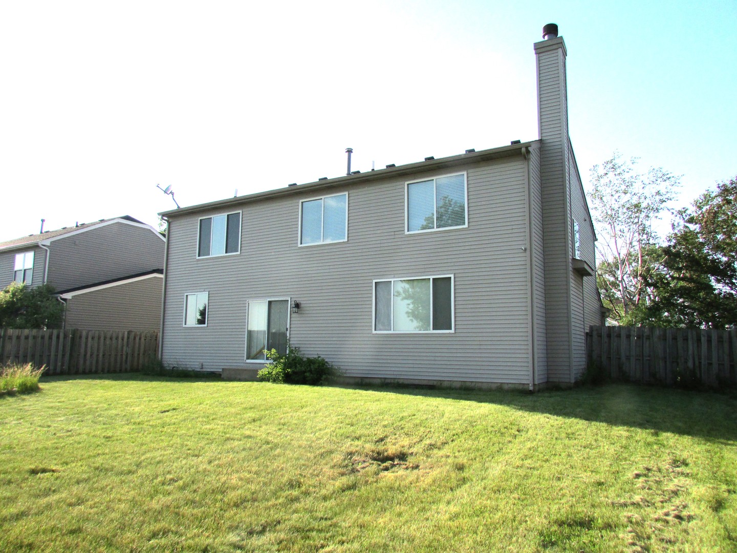 10123 Ashley Street Huntley, IL 60142 - Photo 32 of 33 a front view of a house with a yard