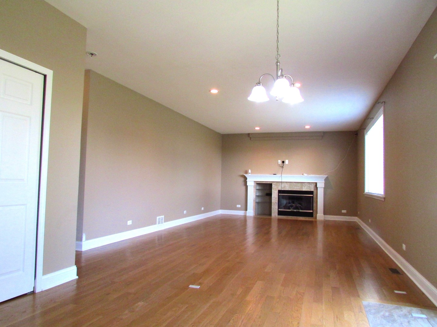 10123 Ashley Street Huntley, IL 60142 - Photo 6 of 33 a view of dining room with furniture and wooden floor
