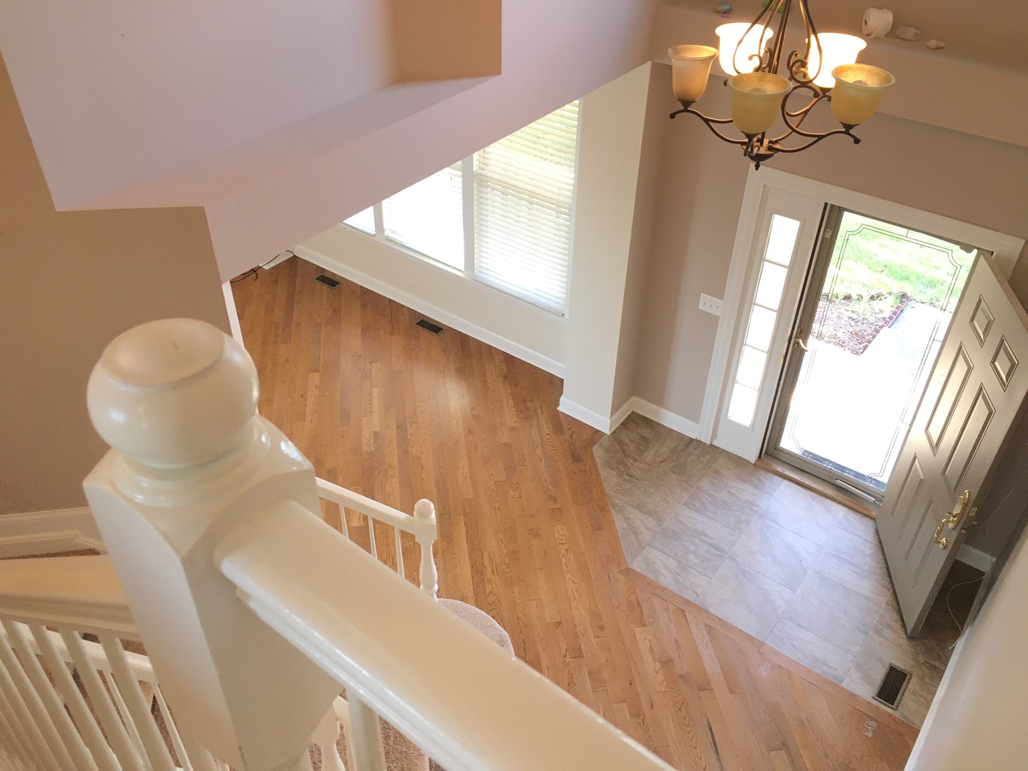 10123 Ashley Street Huntley, IL 60142 - Photo 8 of 33 a view of an entryway with wooden floor