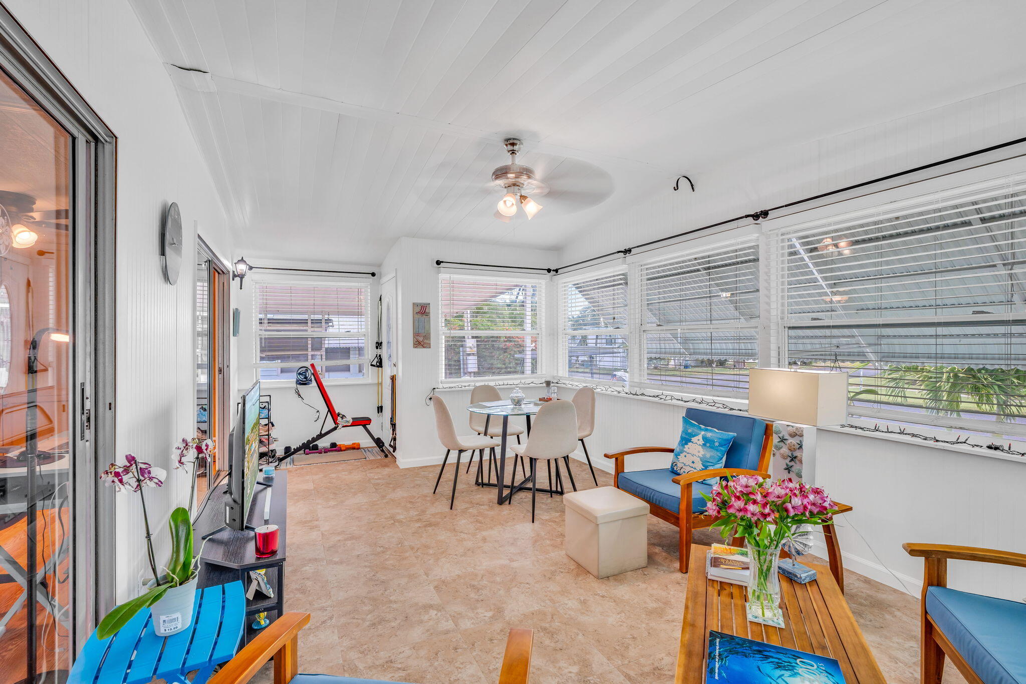 808 South Silver Circle Key Largo, FL 33037 - Photo 17 of 49 a view of a dining room with furniture a chandelier and wooden floor