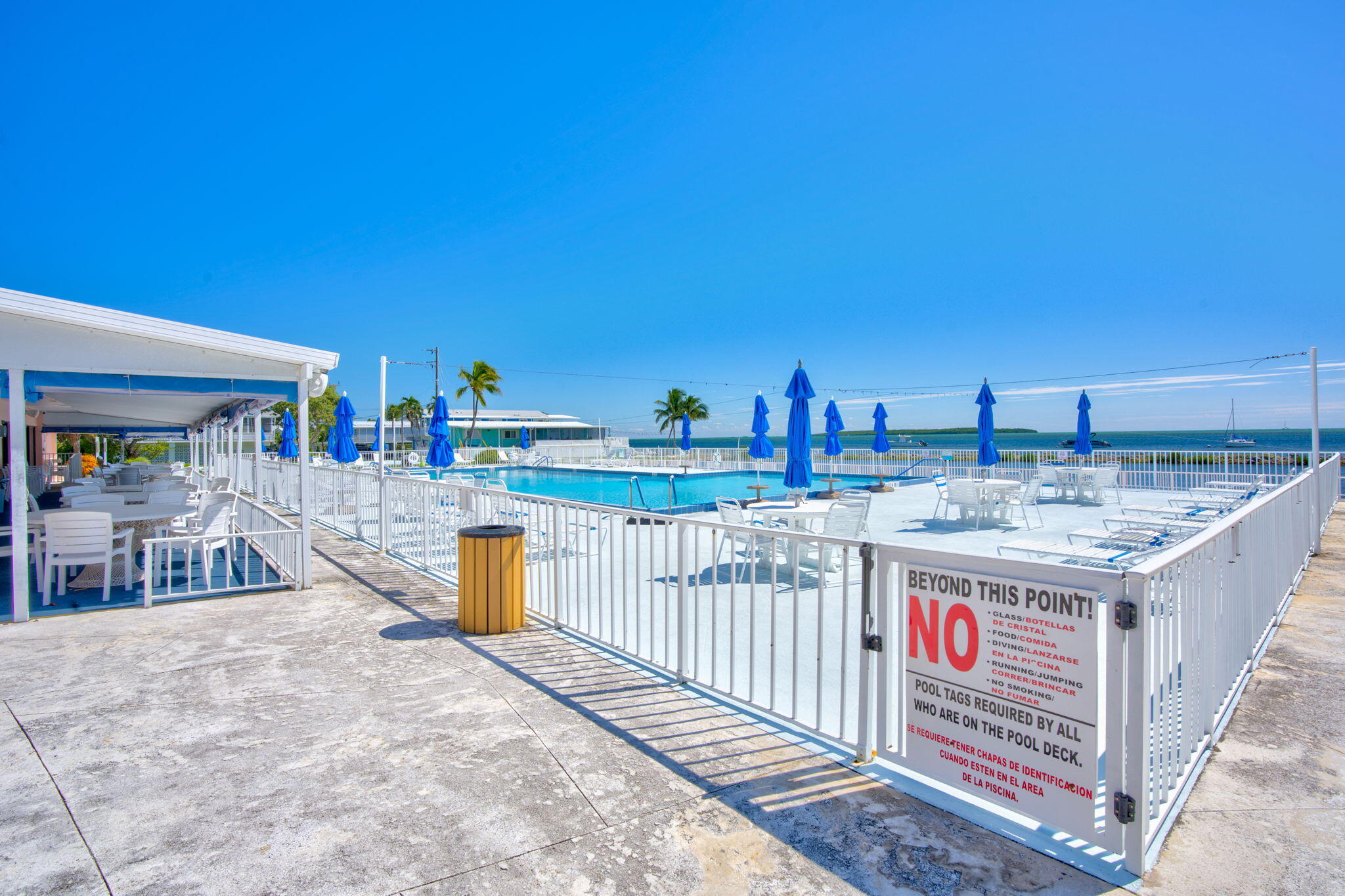 808 South Silver Circle Key Largo, FL 33037 - Photo 30 of 49 a view of roof deck with a barbeque and wooden stairs
