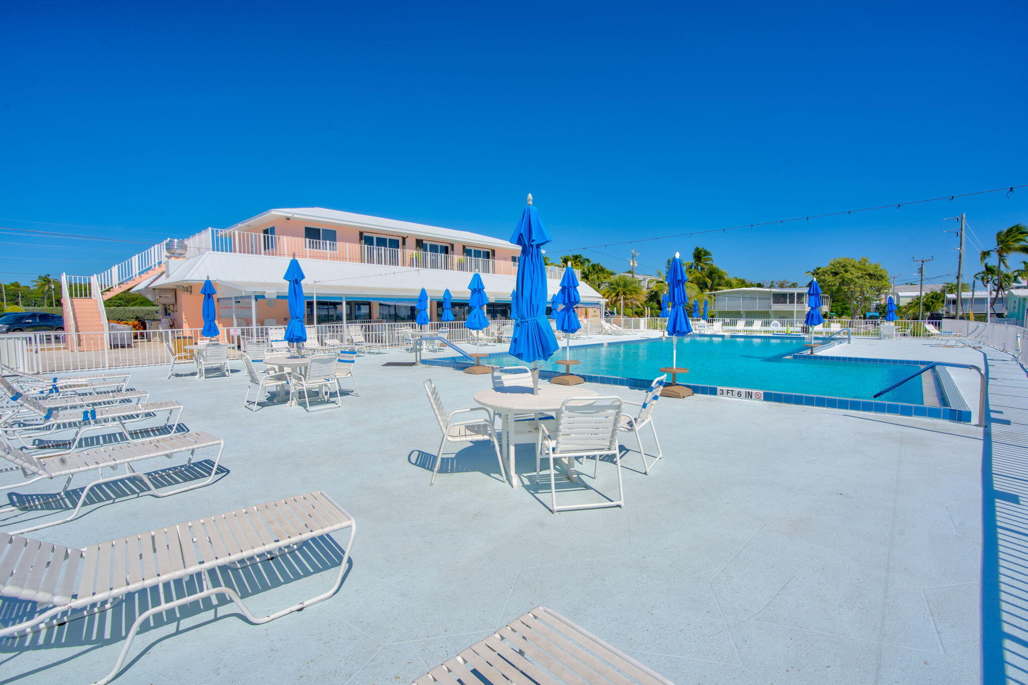 808 South Silver Circle Key Largo, FL 33037 - Photo 33 of 49 a roof deck with table and chairs