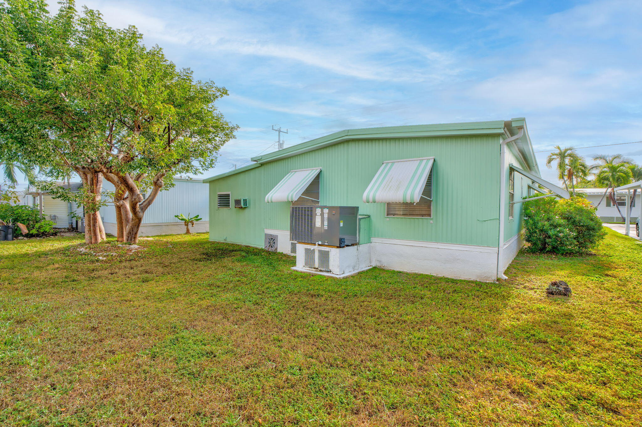 808 South Silver Circle Key Largo, FL 33037 - Photo 39 of 49 a view of a house with a yard