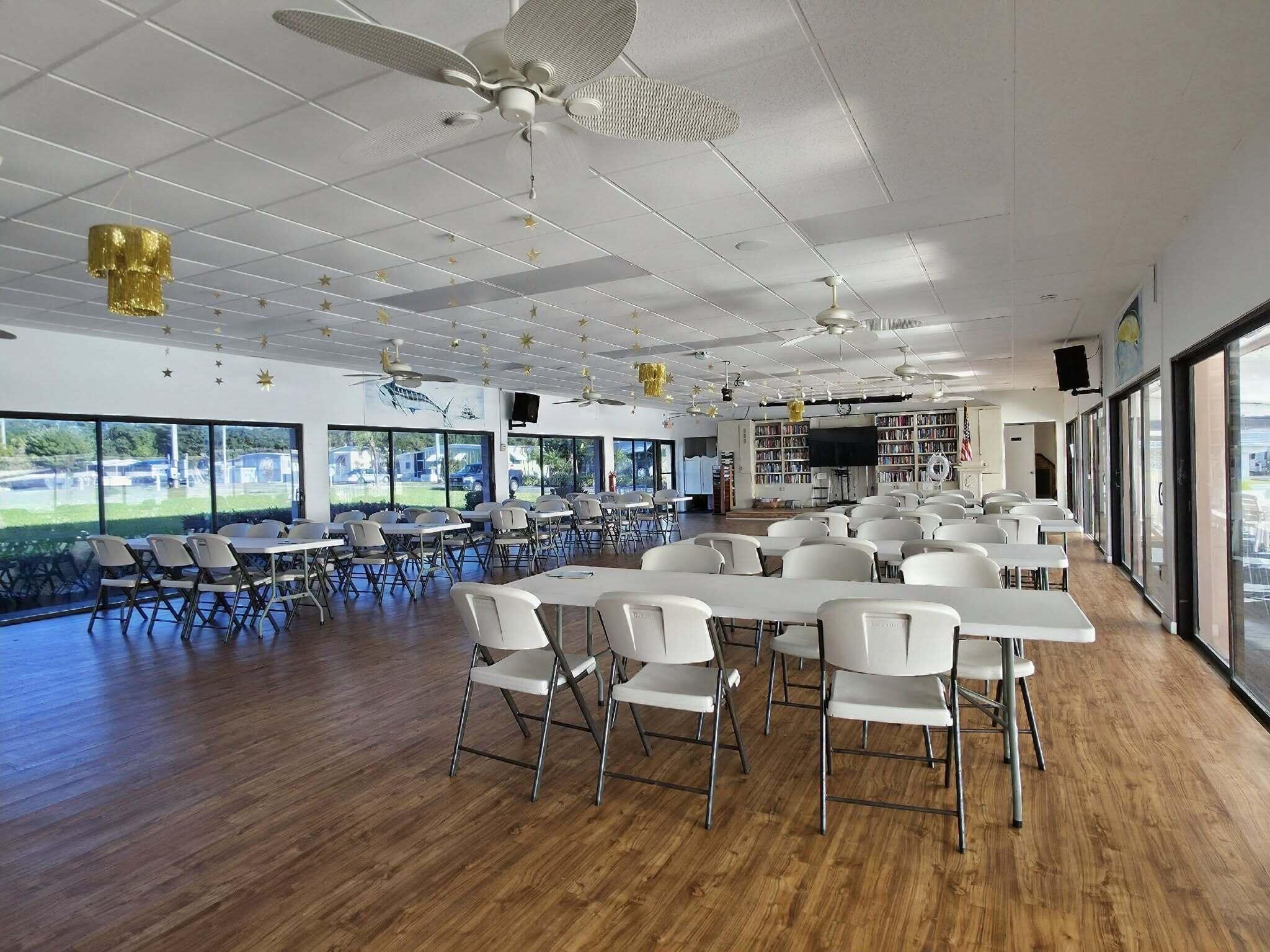 808 South Silver Circle Key Largo, FL 33037 - Photo 44 of 49 a large room with lots of furniture and a wooden floor