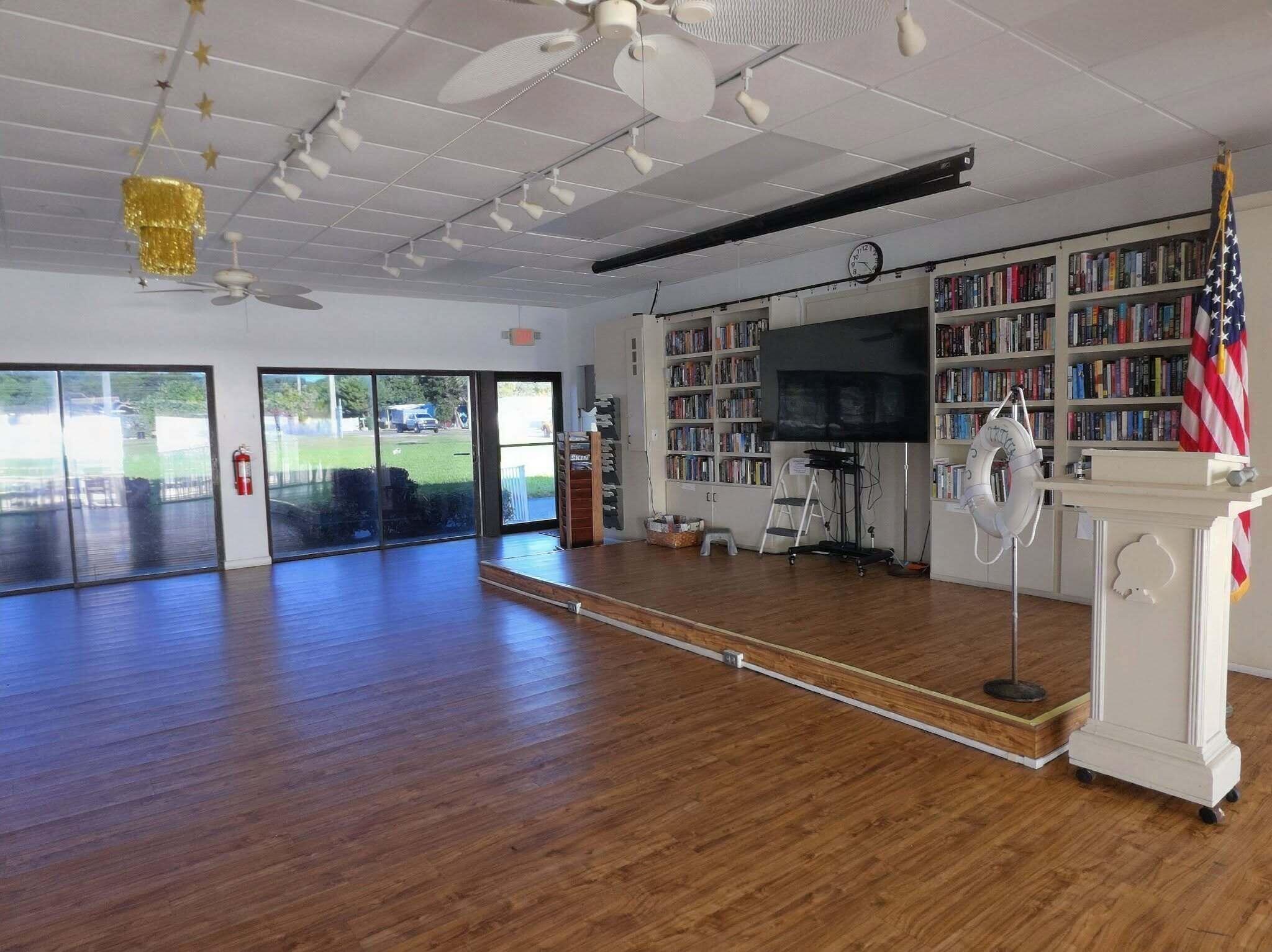 808 South Silver Circle Key Largo, FL 33037 - Photo 47 of 49 a view of an empty room with a window and wooden floor