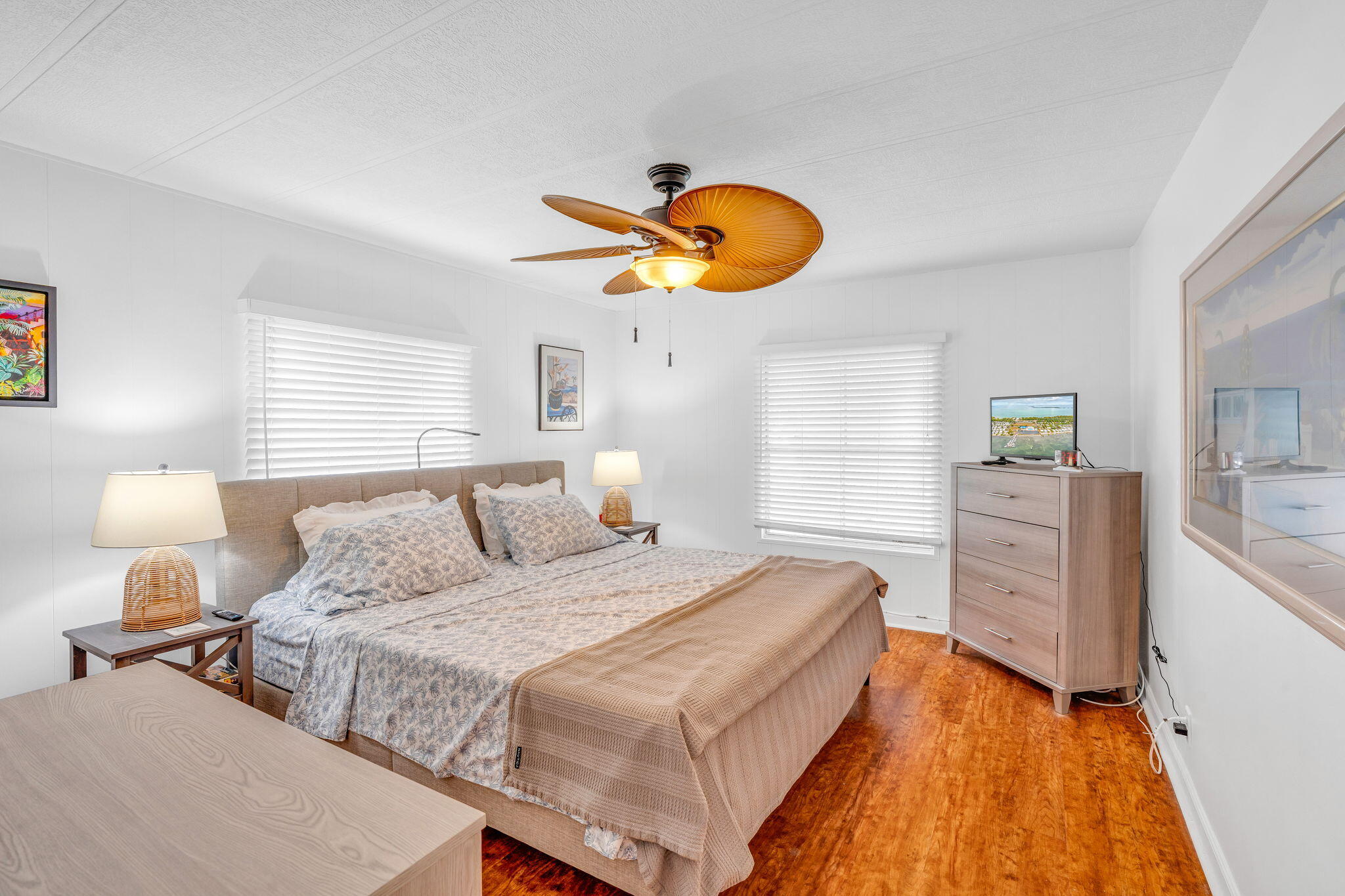 808 South Silver Circle Key Largo, FL 33037 - Photo 5 of 49 a bedroom with a bed and a chandelier