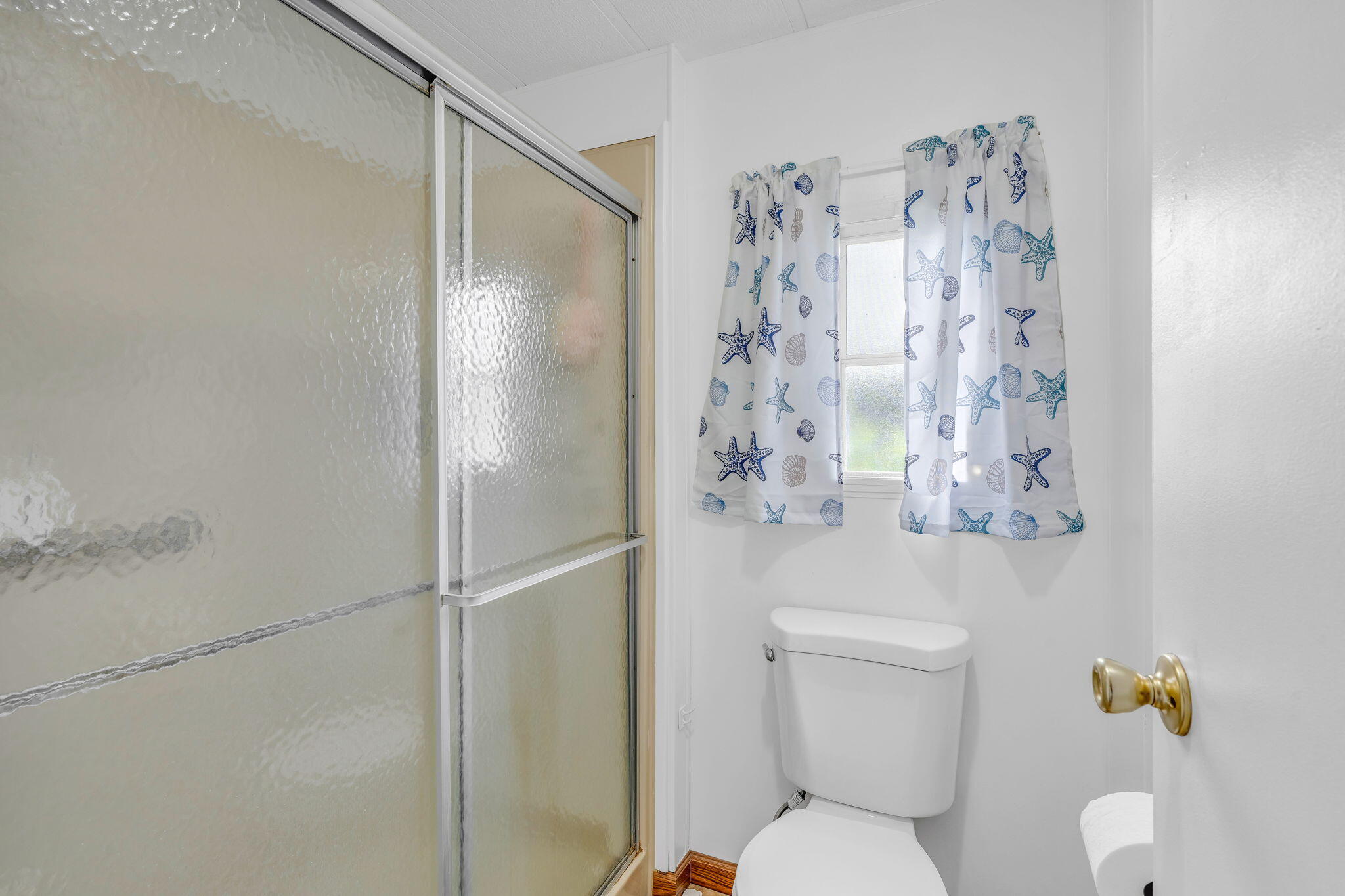 808 South Silver Circle Key Largo, FL 33037 - Photo 6 of 49 a bathroom with a shower and toilet