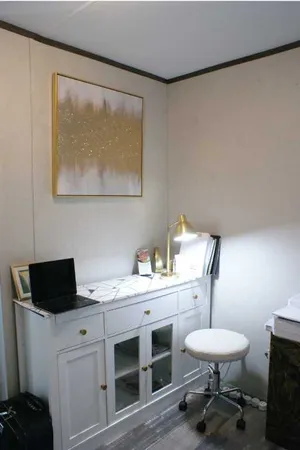 a spacious bathroom with a double vanity sink and a mirror