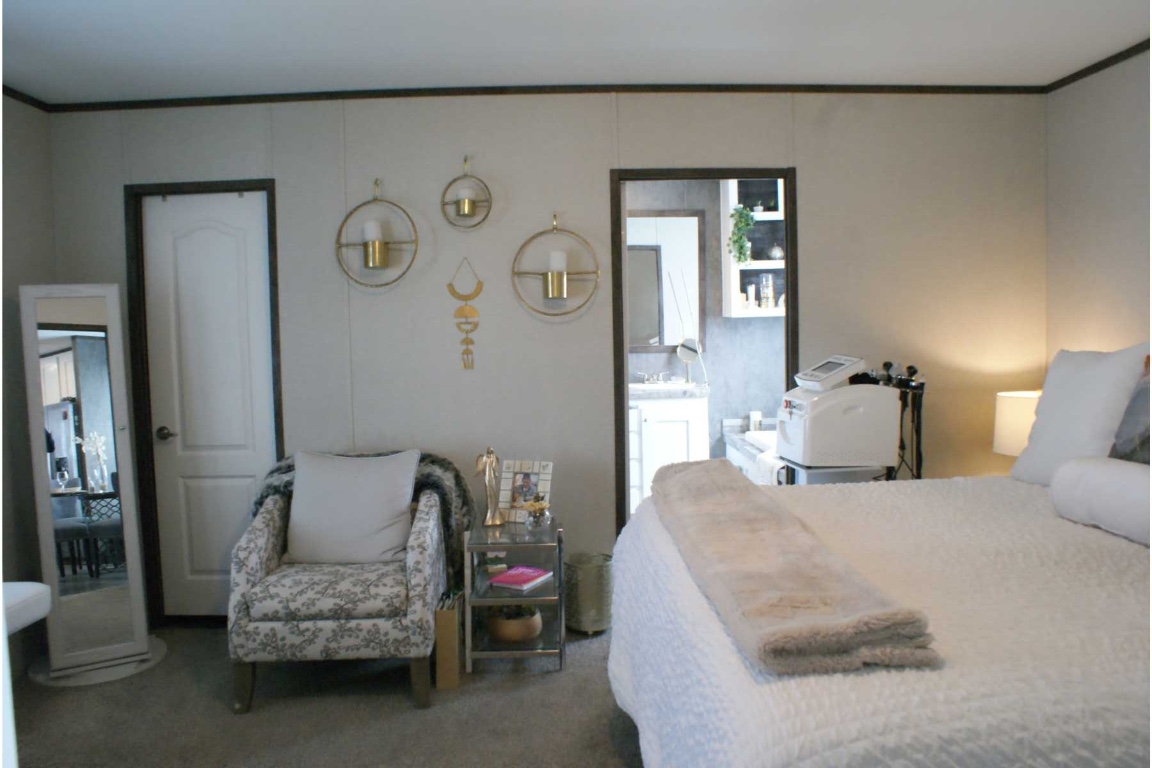 501 Mesquite Road San Marcos, TX 78666 - Photo 10 of 33 Carpeted bedroom featuring crown molding