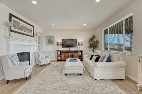 a bathroom with a double vanity sink and mirror with shower