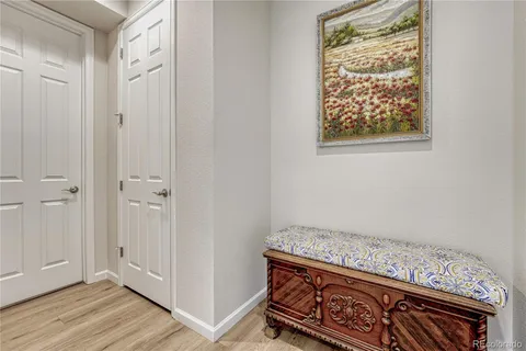 a bedroom with a bed and a desk