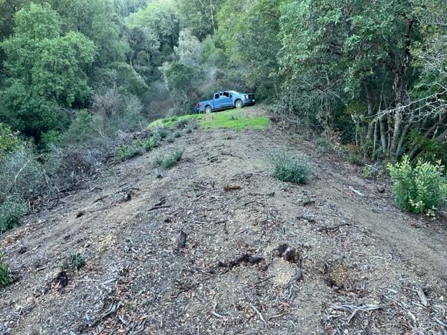 0 Redwood Retreat Road Watsonville, CA 95076 - Photo 3 of 9 a backyard of a house with a yard and entertaining space