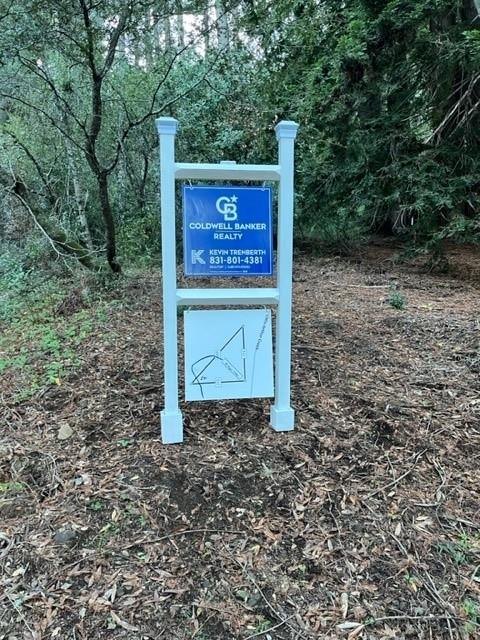 0 Redwood Retreat Road Watsonville, CA 95076 - Photo 9 of 9 a sign that is sitting on a rock