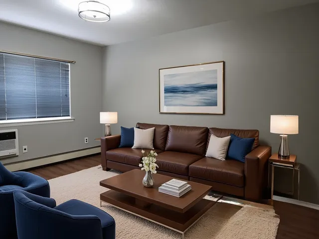 a living room with furniture rug and lamp