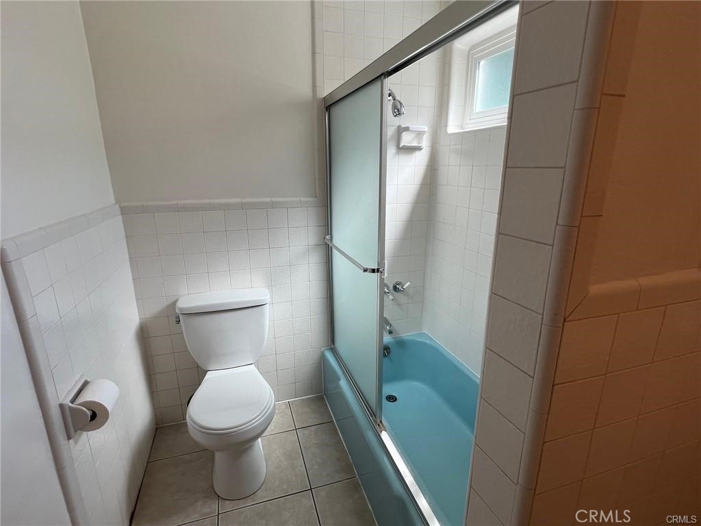 8400 Fordham Road Westchester, CA 90045 - Photo 15 of 25 a bathroom with a toilet and a shower