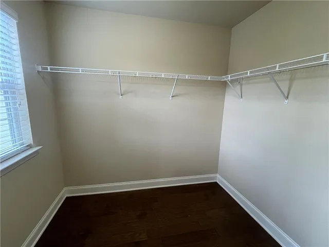 a view of an empty walk in closet