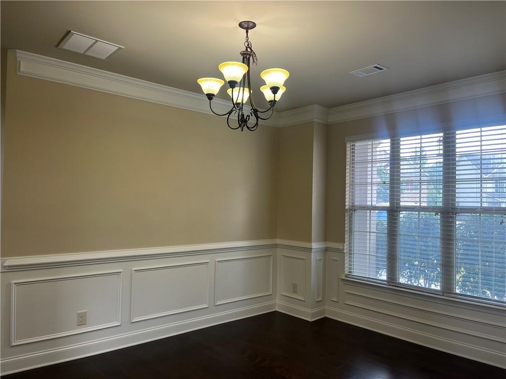 2299 Misty Ivy Court Buford, GA 30519 - Photo 2 of 26 a view of an empty room with a window