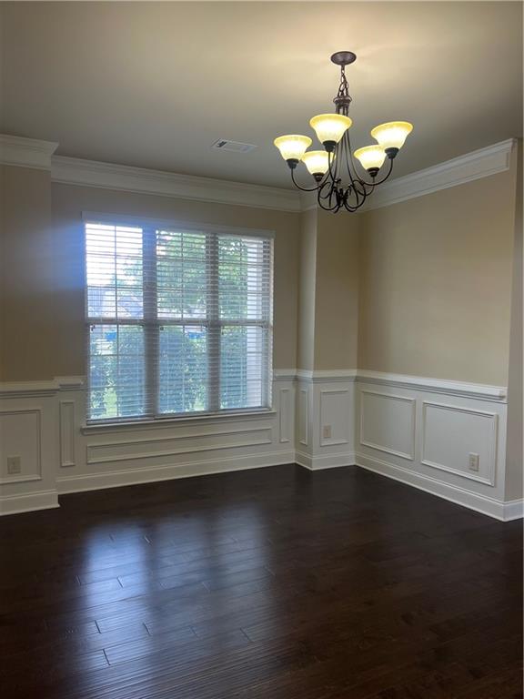 2299 Misty Ivy Court Buford, GA 30519 - Photo 3 of 26 a view of a room with wooden floor and a window