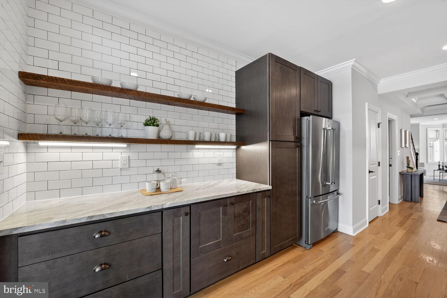 131 P Street Northwest Washington, DC 20001 - Photo 8 of 24 Sleek kitchen with modern elegance.