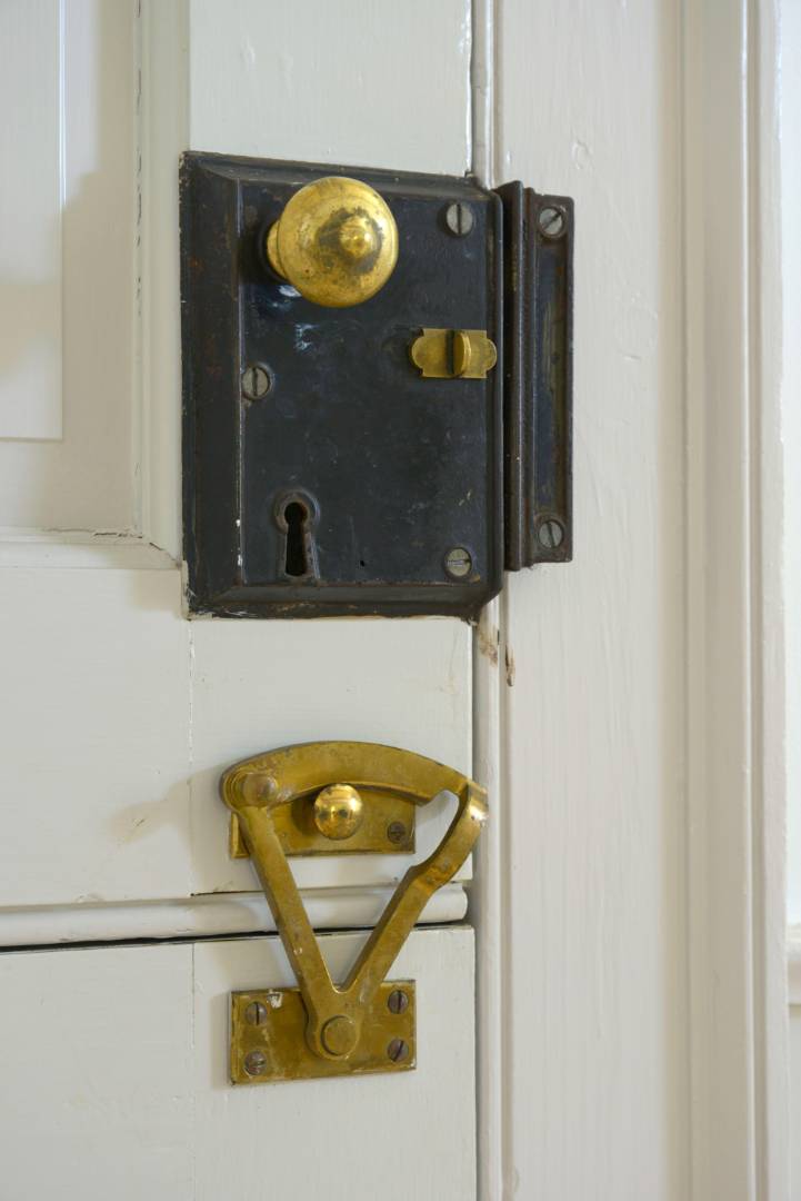 16 Jefferson Street Sag Harbor, NY 11963 - Photo 17 of 22 a bathroom with a sink and mirror