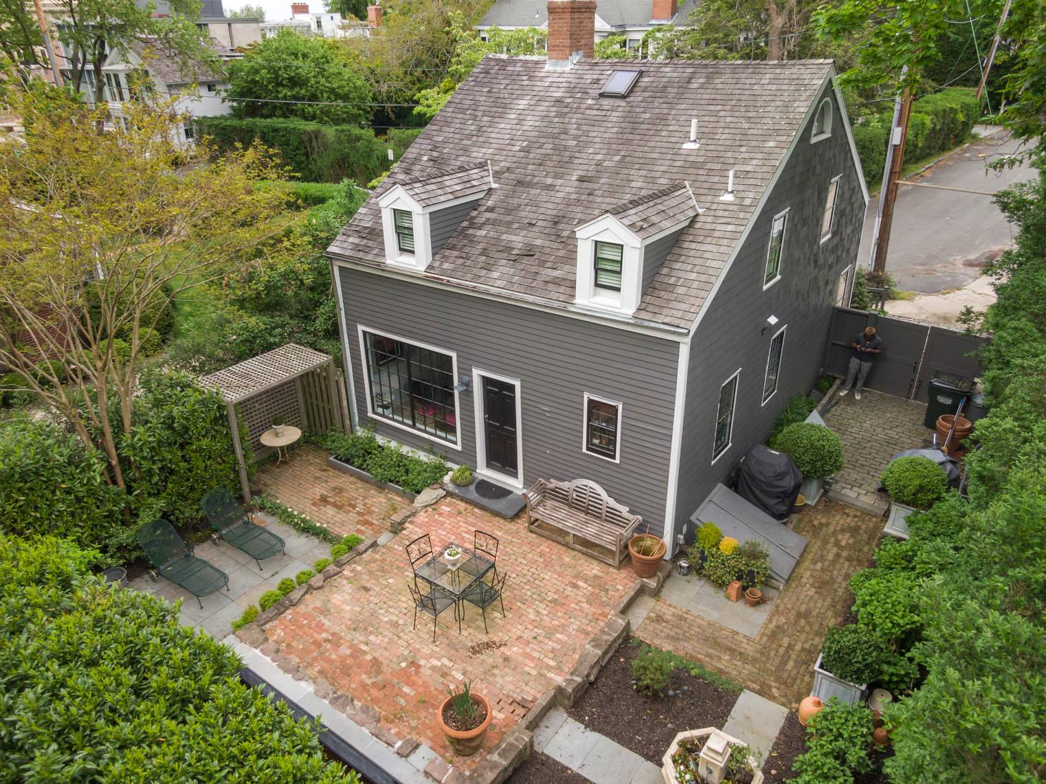 16 Jefferson Street Sag Harbor, NY 11963 - Photo 20 of 22 an aerial view of a house with table and chairs