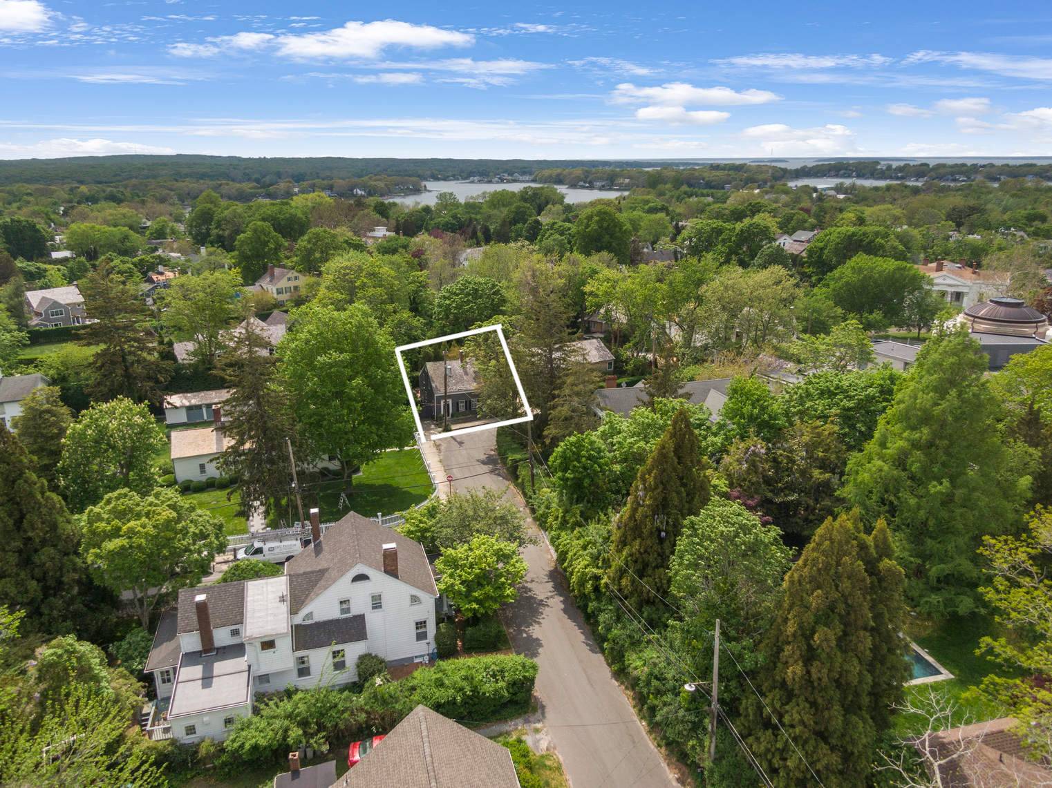 16 Jefferson Street Sag Harbor, NY 11963 - Photo 22 of 22 a view of a city with lush green forest