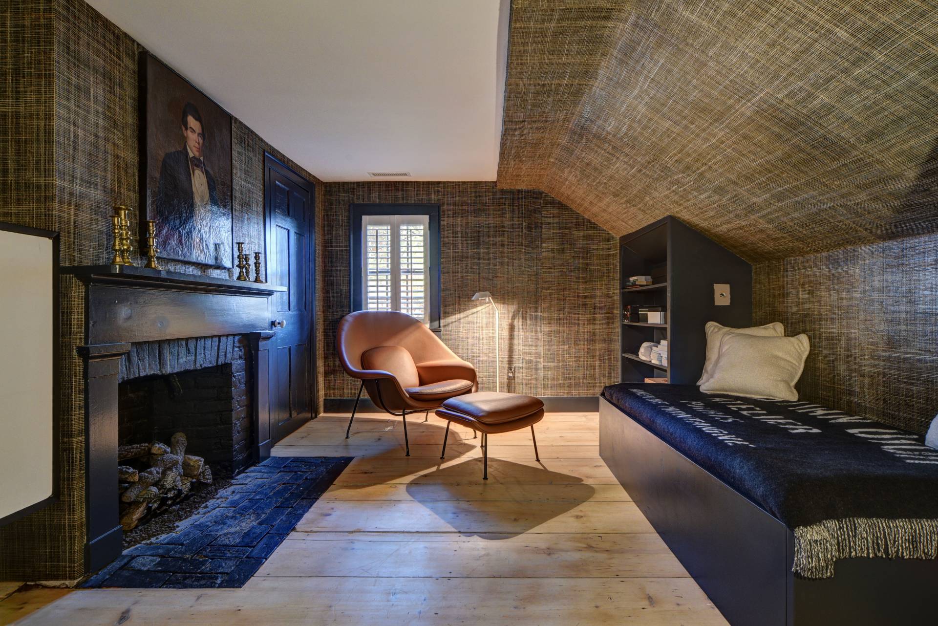 16 Jefferson Street Sag Harbor, NY 11963 - Photo 10 of 22 a living room with furniture and a fireplace