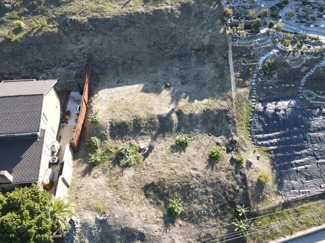 a view of a backyard of a house