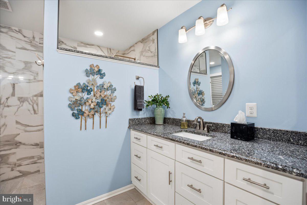14382 Sedwick Avenue Solomons, MD 20688 - Photo 21 of 90 This vanity is one of two in the primary bath