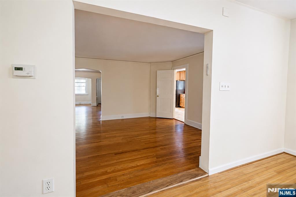 298 Audubon Road Englewood, NJ 07631 - Photo 5 of 19 a view of hallway with wooden floor
