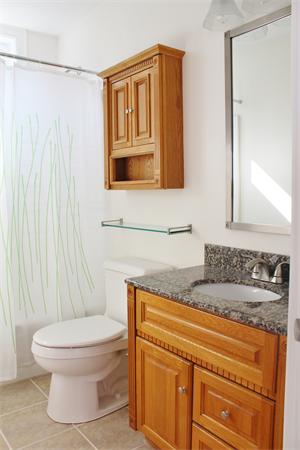 11 Bush Street Wareham, MA 02532 - Photo 5 of 17 a bathroom with a granite countertop sink toilet and mirror