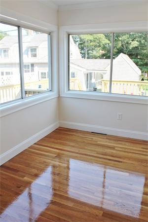 11 Bush Street Wareham, MA 02532 - Photo 7 of 17 a view of a room with wooden floor and windows
