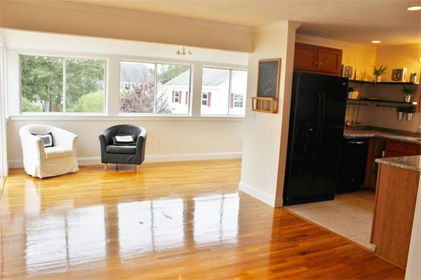 11 Bush Street Wareham, MA 02532 - Photo 10 of 17 a view of furniture and kitchen with wooden floor
