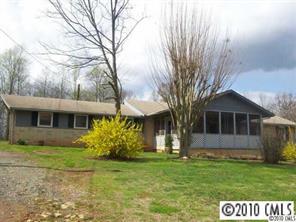 515 Absher Road Bessemer City, NC 28016 - Photo 1 of 16 a front view of a house with garden