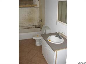 515 Absher Road Bessemer City, NC 28016 - Photo 12 of 16 a bathroom with a sink and a mirror