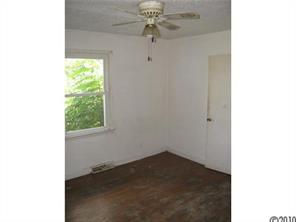 515 Absher Road Bessemer City, NC 28016 - Photo 13 of 16 a view of a hallway with a window