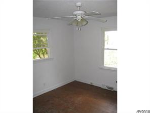 515 Absher Road Bessemer City, NC 28016 - Photo 14 of 16 a view of a chandelier fan in a room