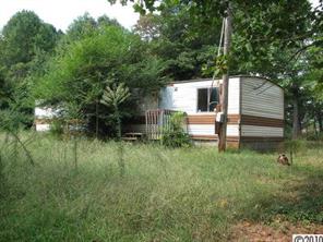 515 Absher Road Bessemer City, NC 28016 - Photo 5 of 16 a house view with a backyard space