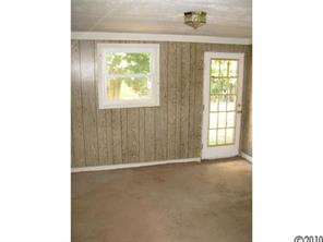 515 Absher Road Bessemer City, NC 28016 - Photo 8 of 16 a view of an empty room with a window