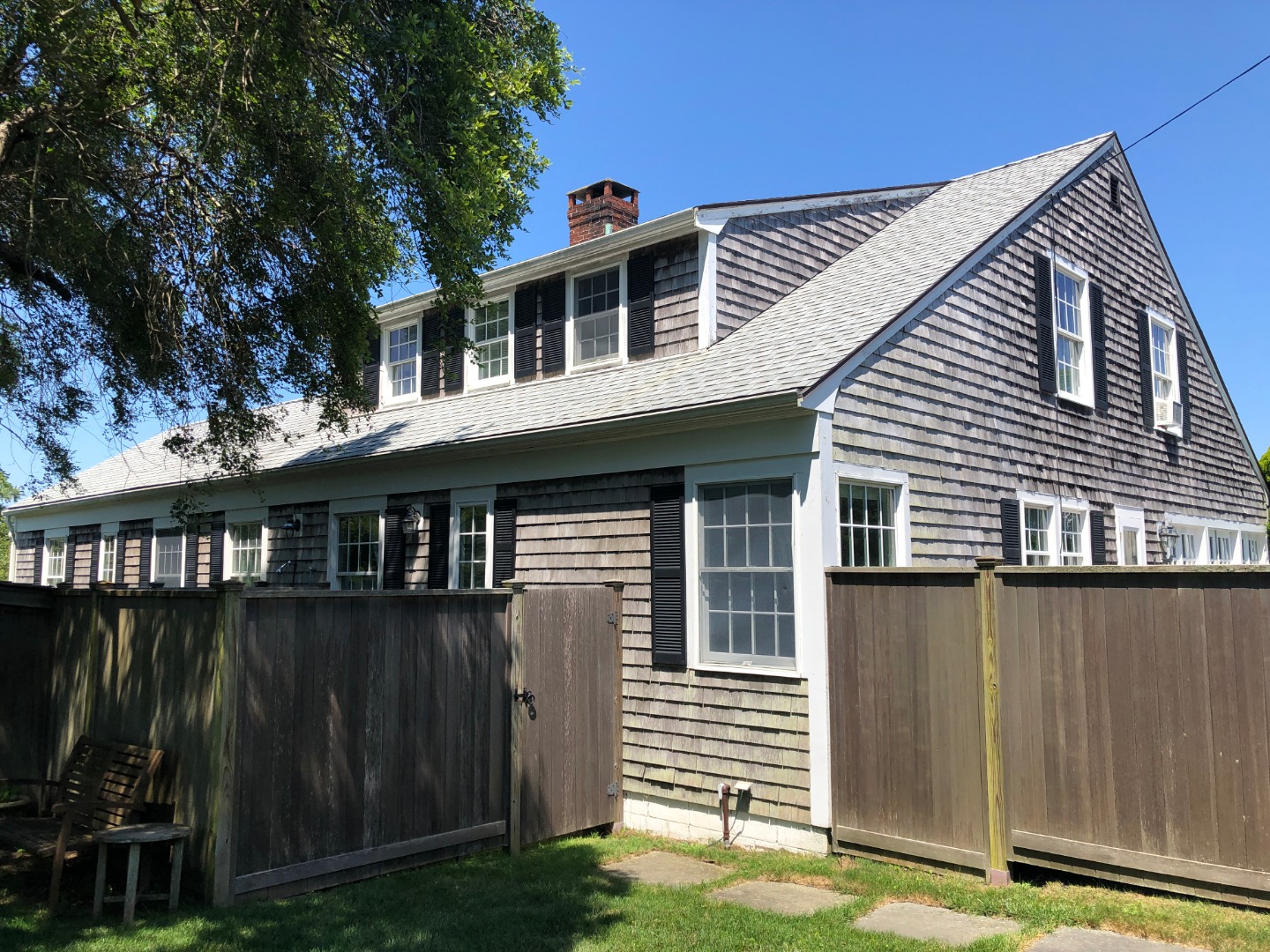 12 Atwood Circle Edgartown, MA 02539 - Photo 12 of 16 front view of a house with a yard