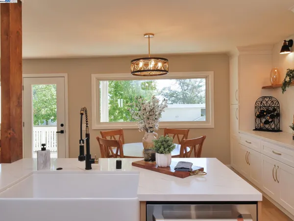 a dining table with a window