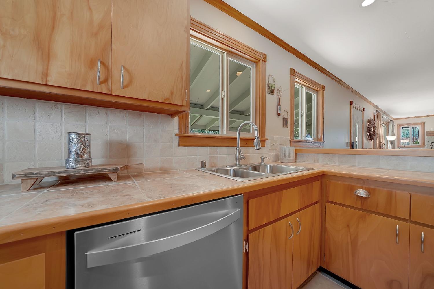 10801 Shenandoah Road Plymouth, CA 95669 - Photo 16 of 45 a kitchen with a sink and cabinets