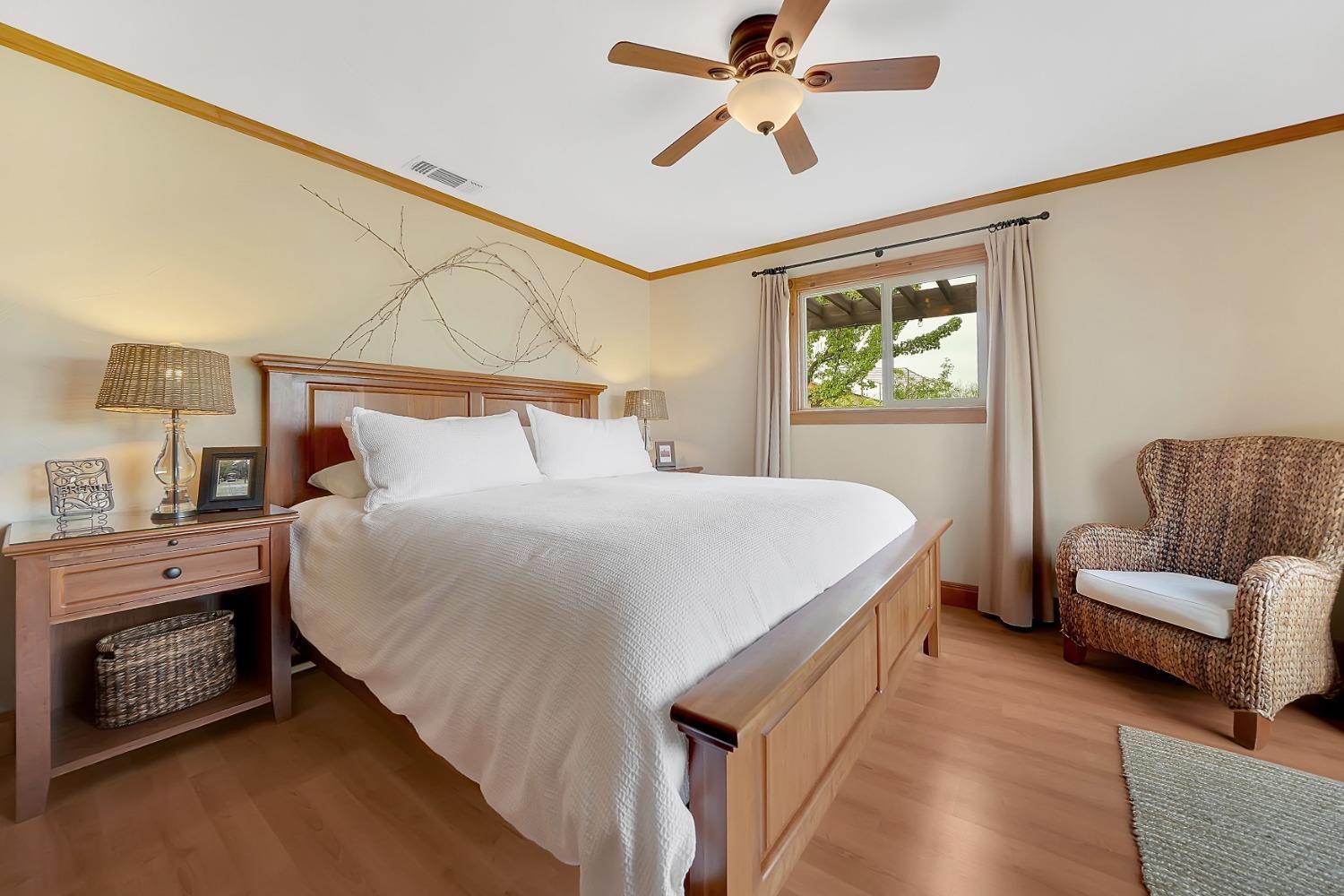 10801 Shenandoah Road Plymouth, CA 95669 - Photo 21 of 45 a bedroom with a bed and a couch