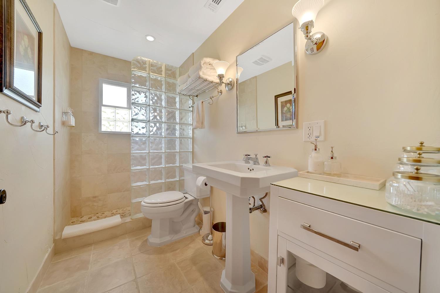 10801 Shenandoah Road Plymouth, CA 95669 - Photo 23 of 45 a bathroom with a sink toilet and shower