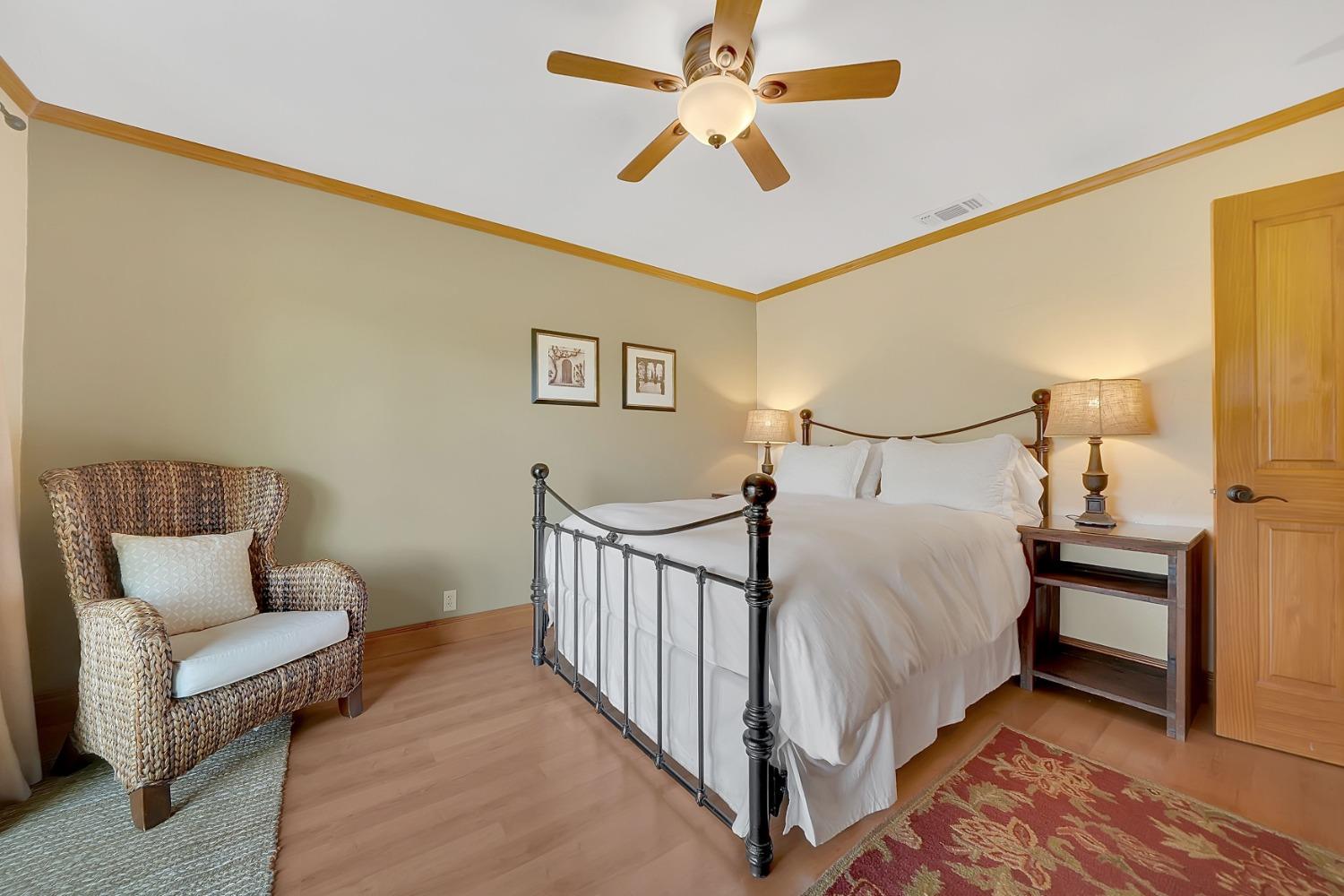 10801 Shenandoah Road Plymouth, CA 95669 - Photo 27 of 45 a bedroom with a bed and a couch