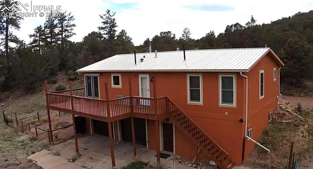 7878 County Road 28 Cotopaxi, CO 81223 - Photo 22 of 23 a front view of a house with a yard