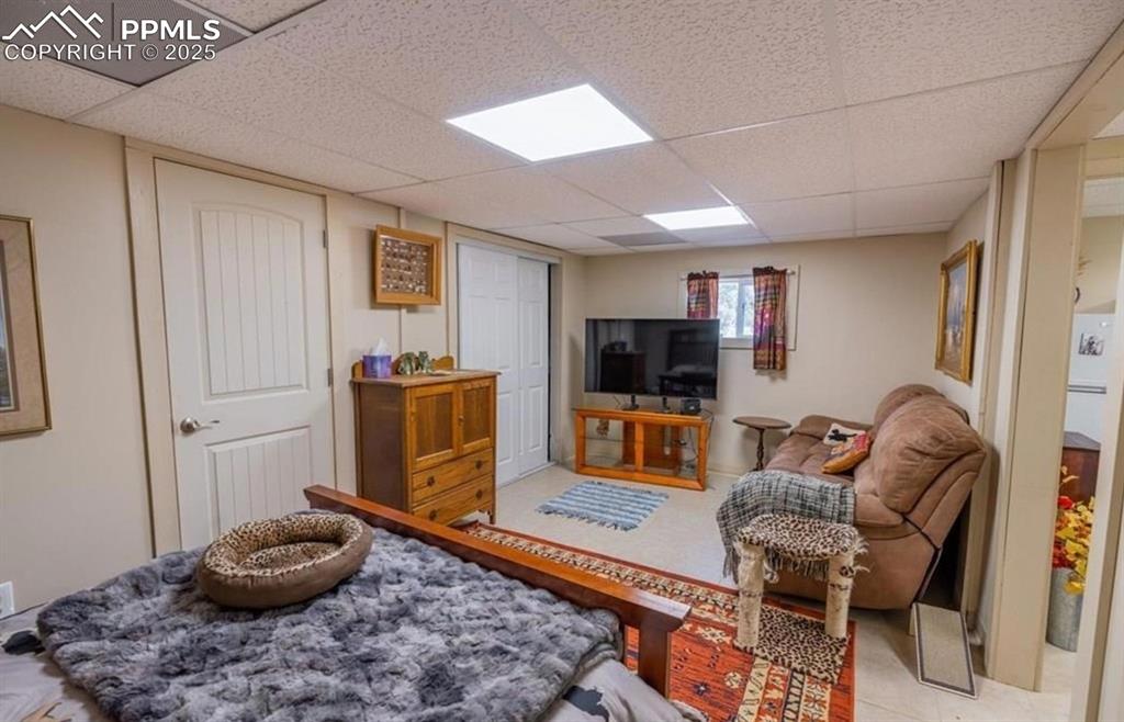 7878 County Road 28 Cotopaxi, CO 81223 - Photo 7 of 23 a living room with furniture and a flat screen tv
