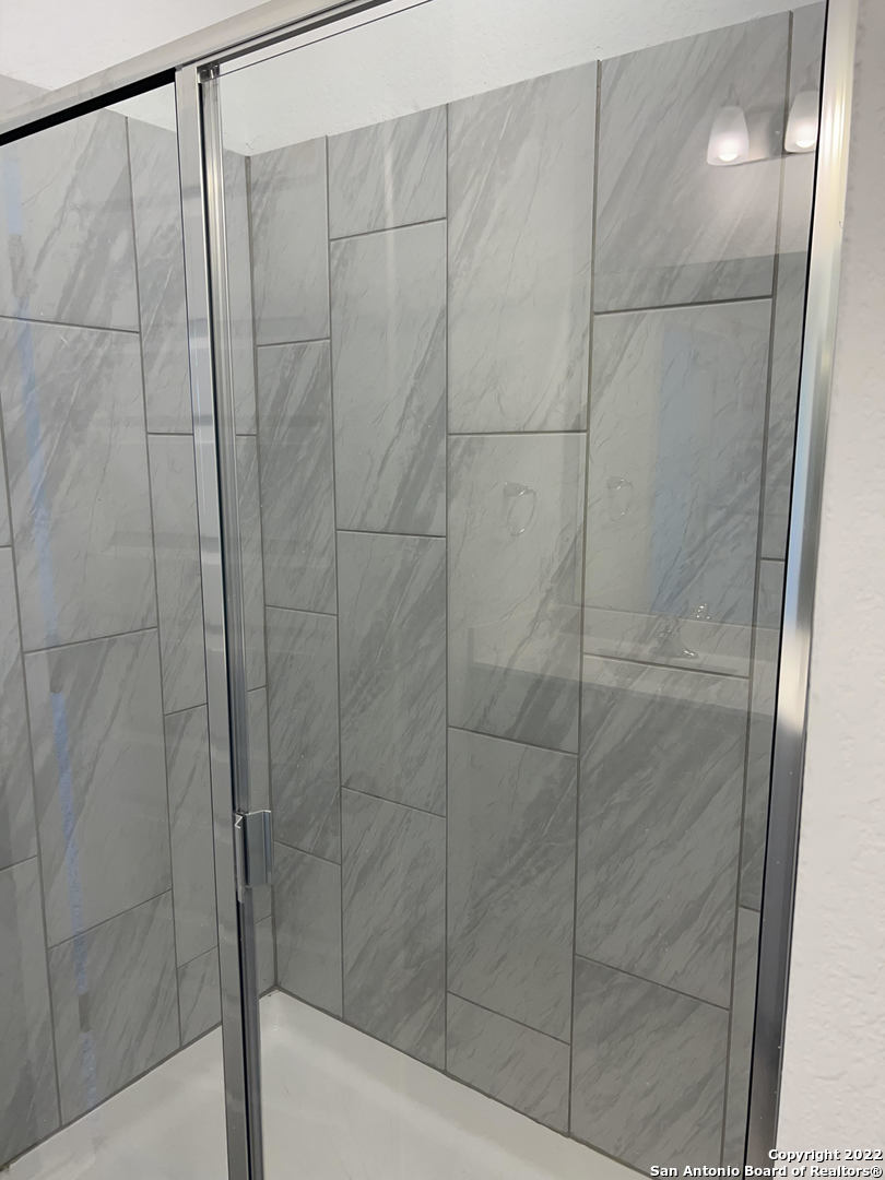 2164 Griffith Drive Seguin, TX 78155 - Photo 15 of 21 a bathroom with a shower