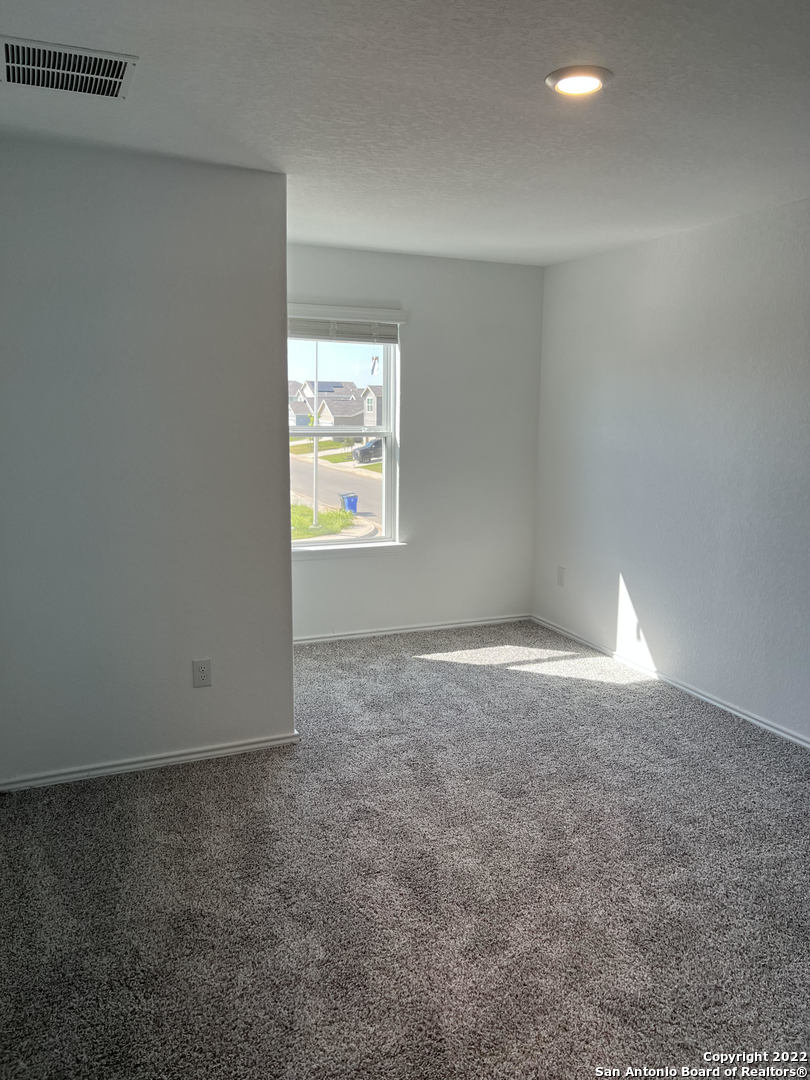 2164 Griffith Drive Seguin, TX 78155 - Photo 16 of 21 an empty room with windows