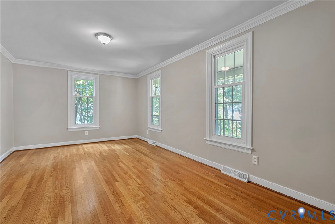 8707 Brown Summit Road North Chesterfield, VA 23235 - Photo 14 of 72 Hardwood flooring complemented by white trim, crow